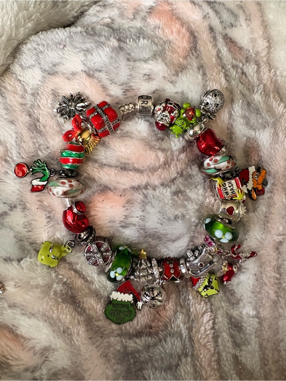 Pandora bracelet with Grinch theme Pandora, Linx, and Gnoce charms